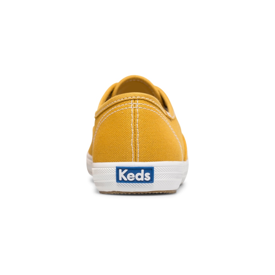 Keds Women\s Champion Algodão Orgânico Lona Colheita Ouro
